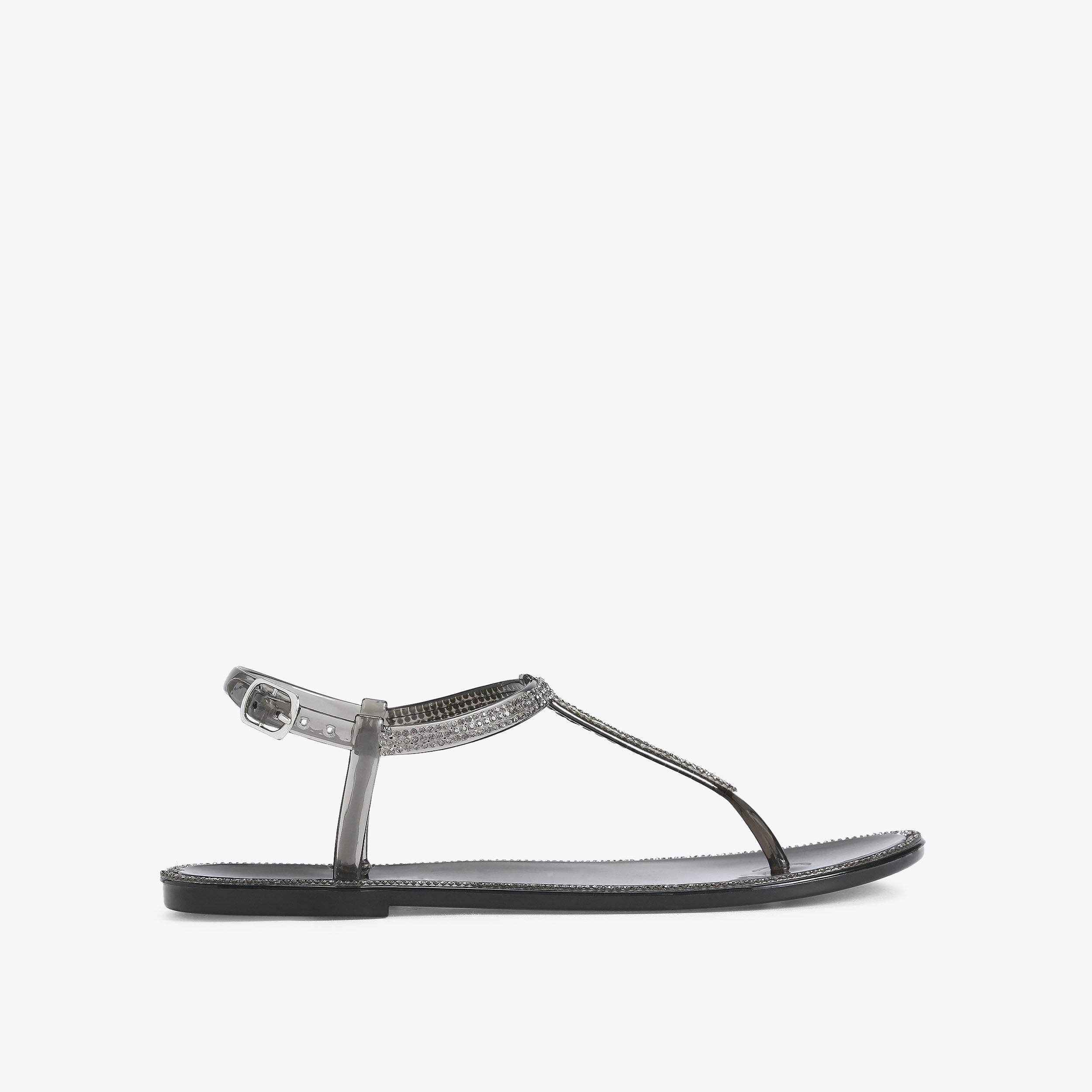 SPARKLE Black T Post Sandals by CARVELA