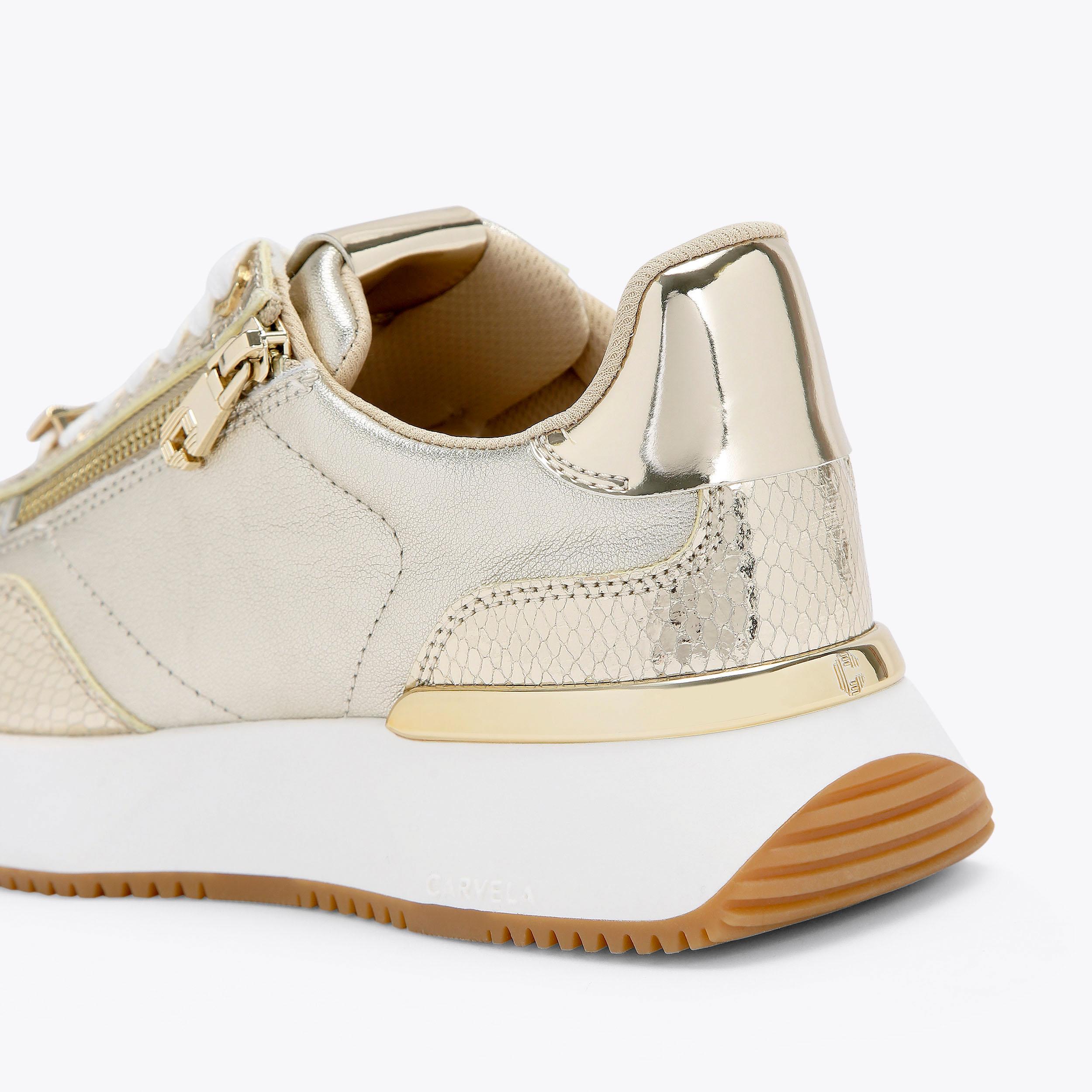 FLARE ZIP Gold Trainer by CARVELA