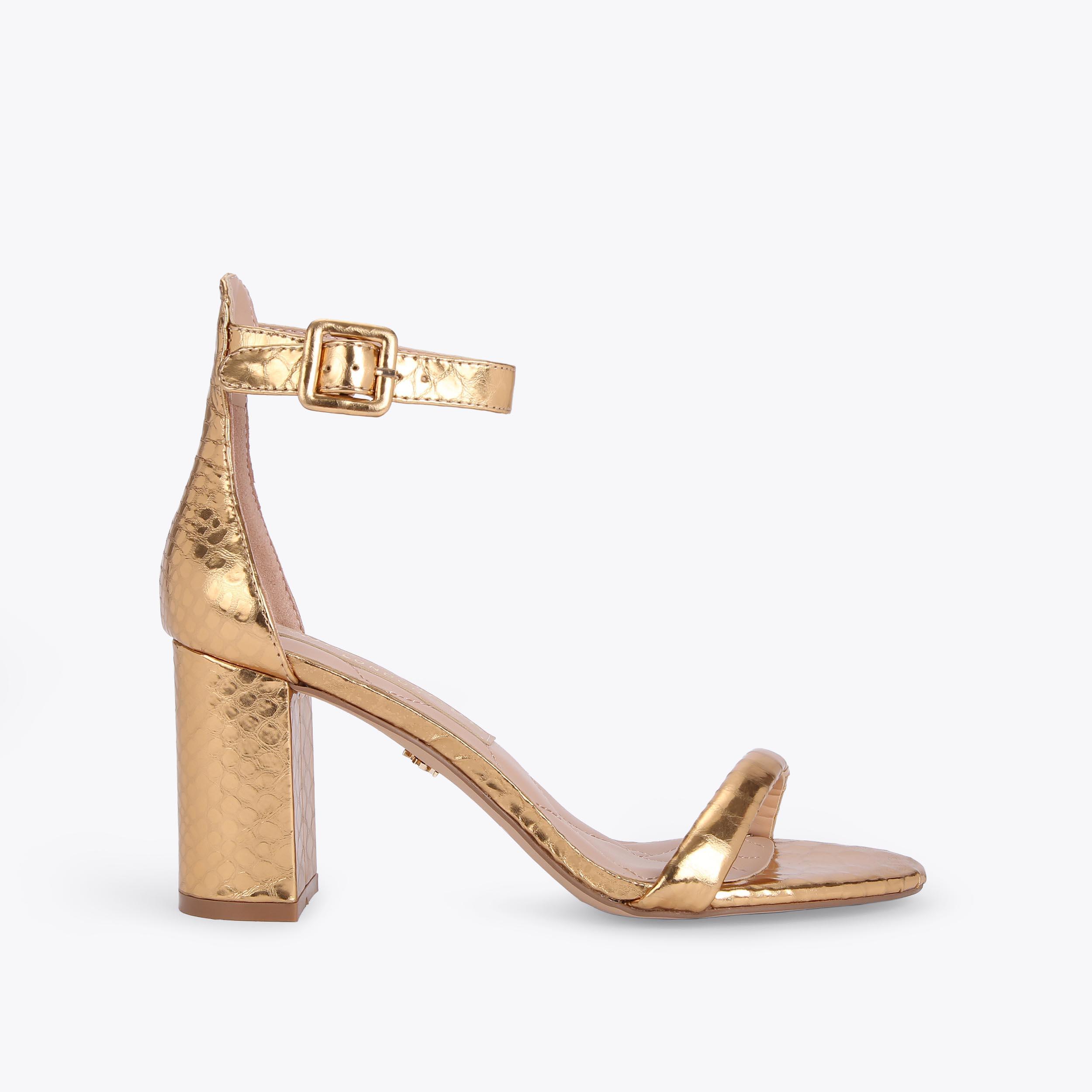 Kurt geiger gold 2025 block heel sandals