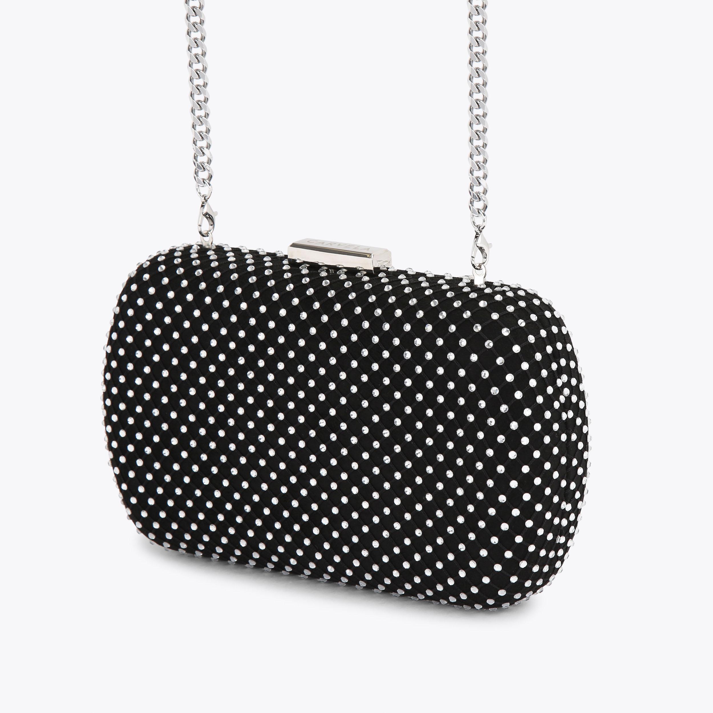 Black and clearance white clutch bag