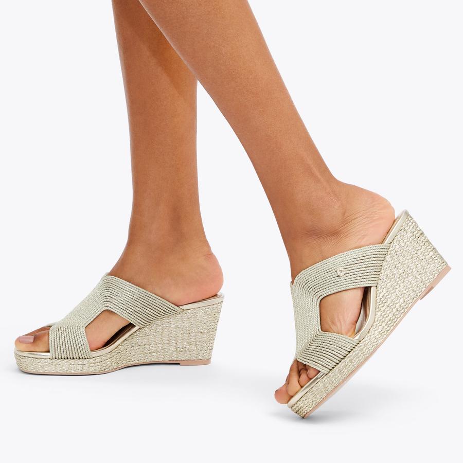 Wedge heeled mules top