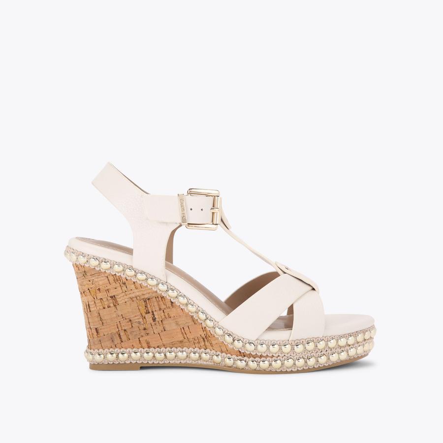 SUPER STUD Bone Wedge Heels by CARVELA