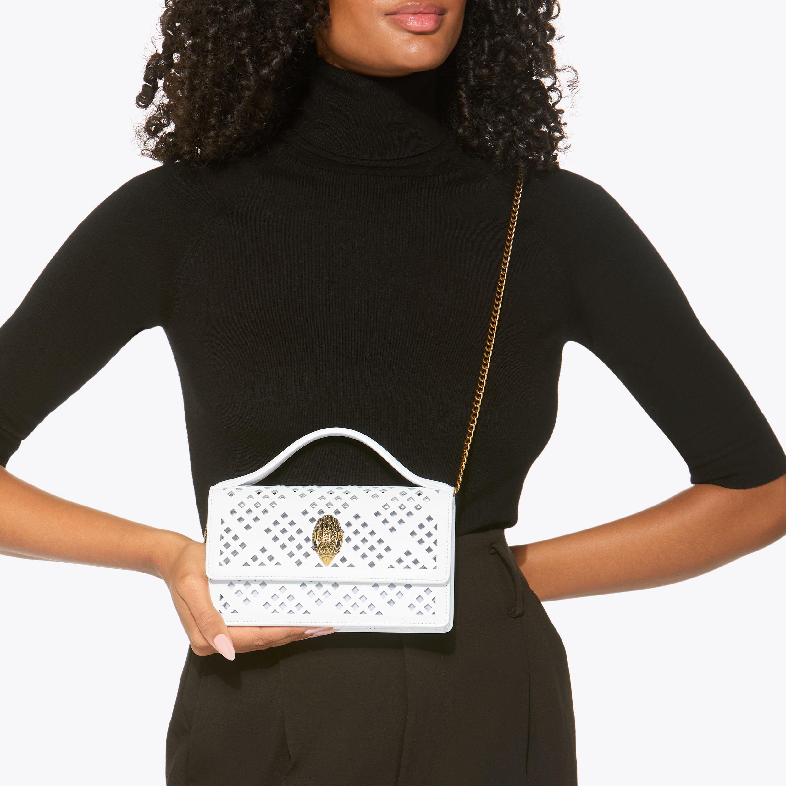 ハンドバッグ LEATHER NANO M TOP HANDLE BAG Nano Top Handle Bag has a paper bag construction, with a