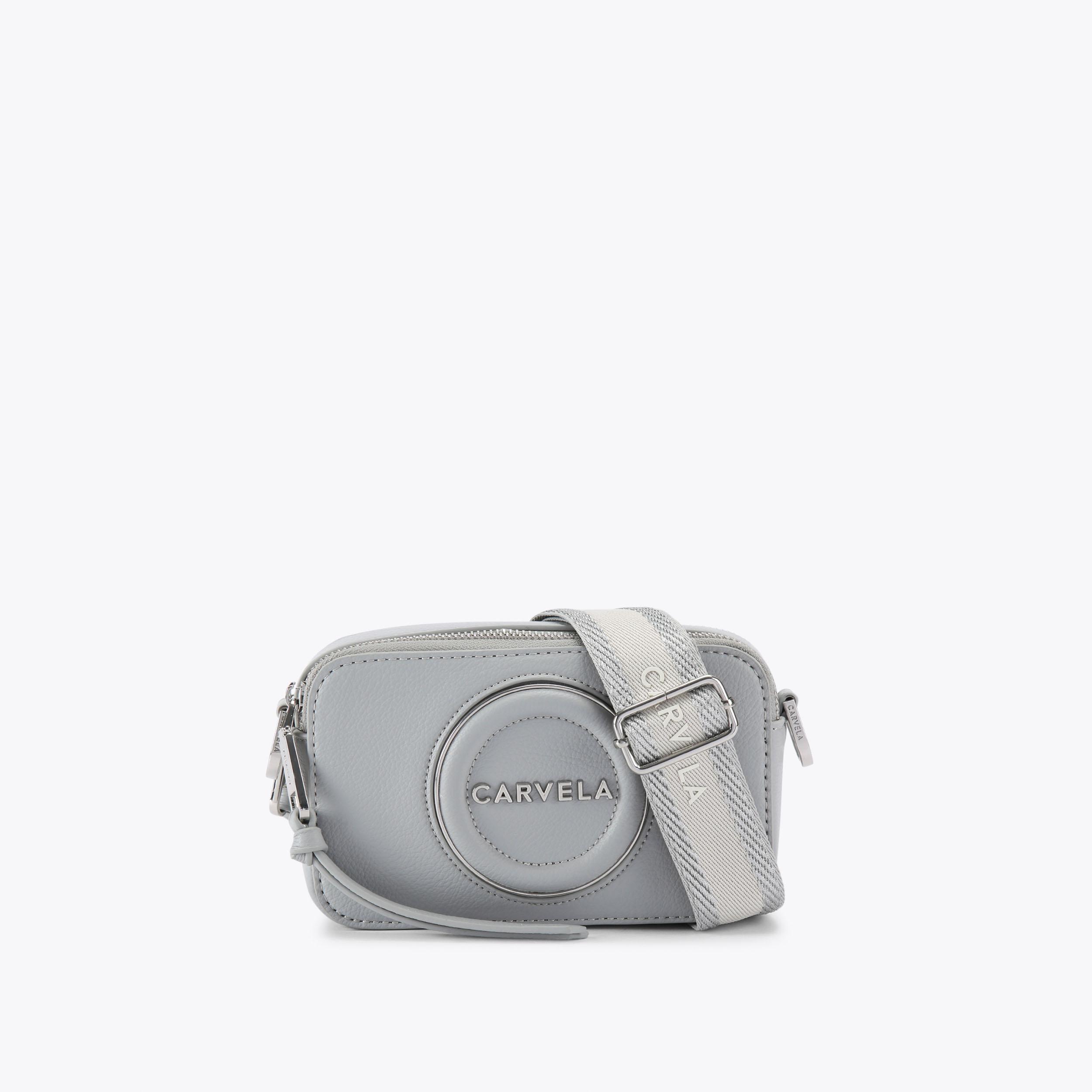 MINI ROMA CIRCLE Pale Blue Mini Circle Camera Bag by CARVELA