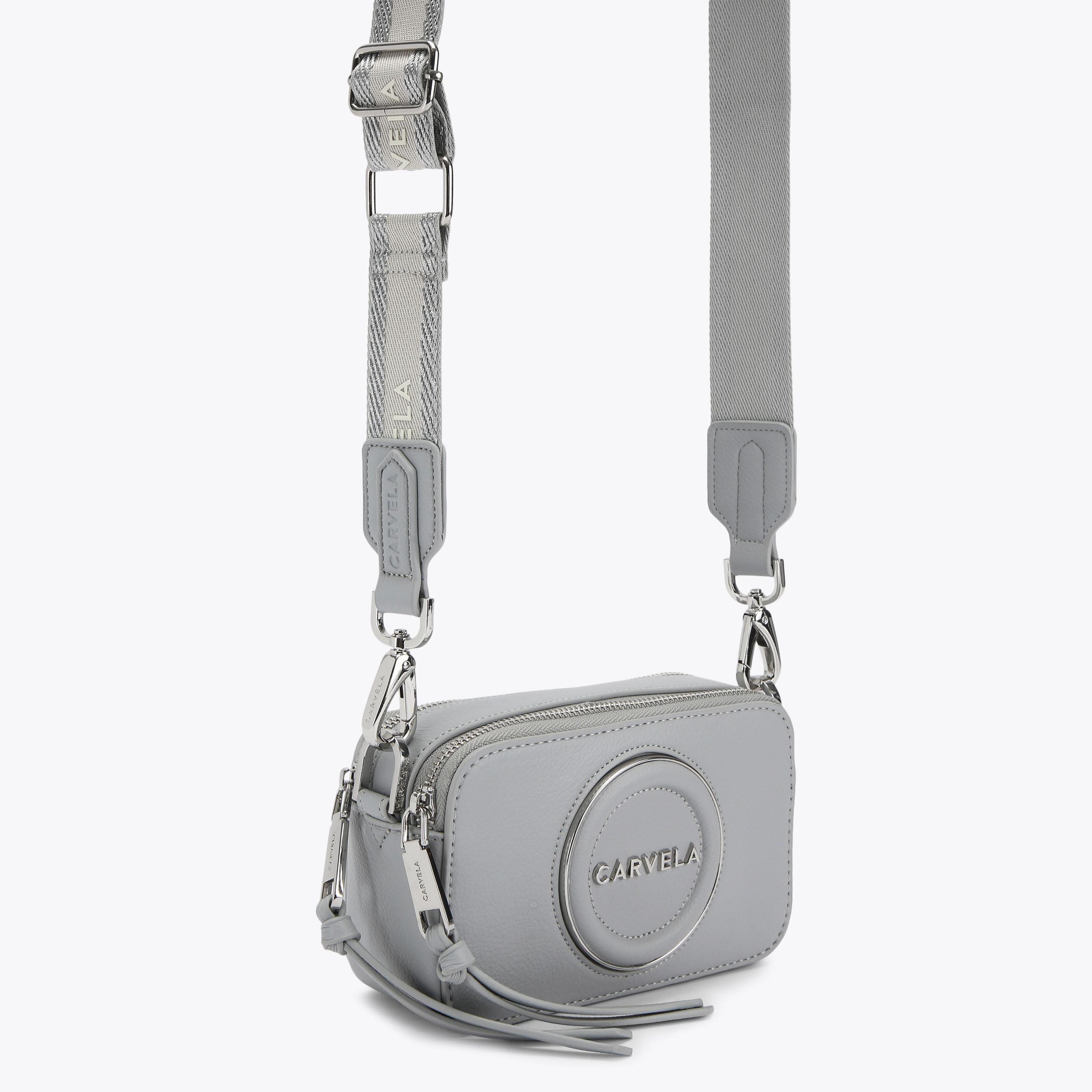 MINI ROMA CIRCLE Pale Blue Mini Circle Camera Bag by CARVELA