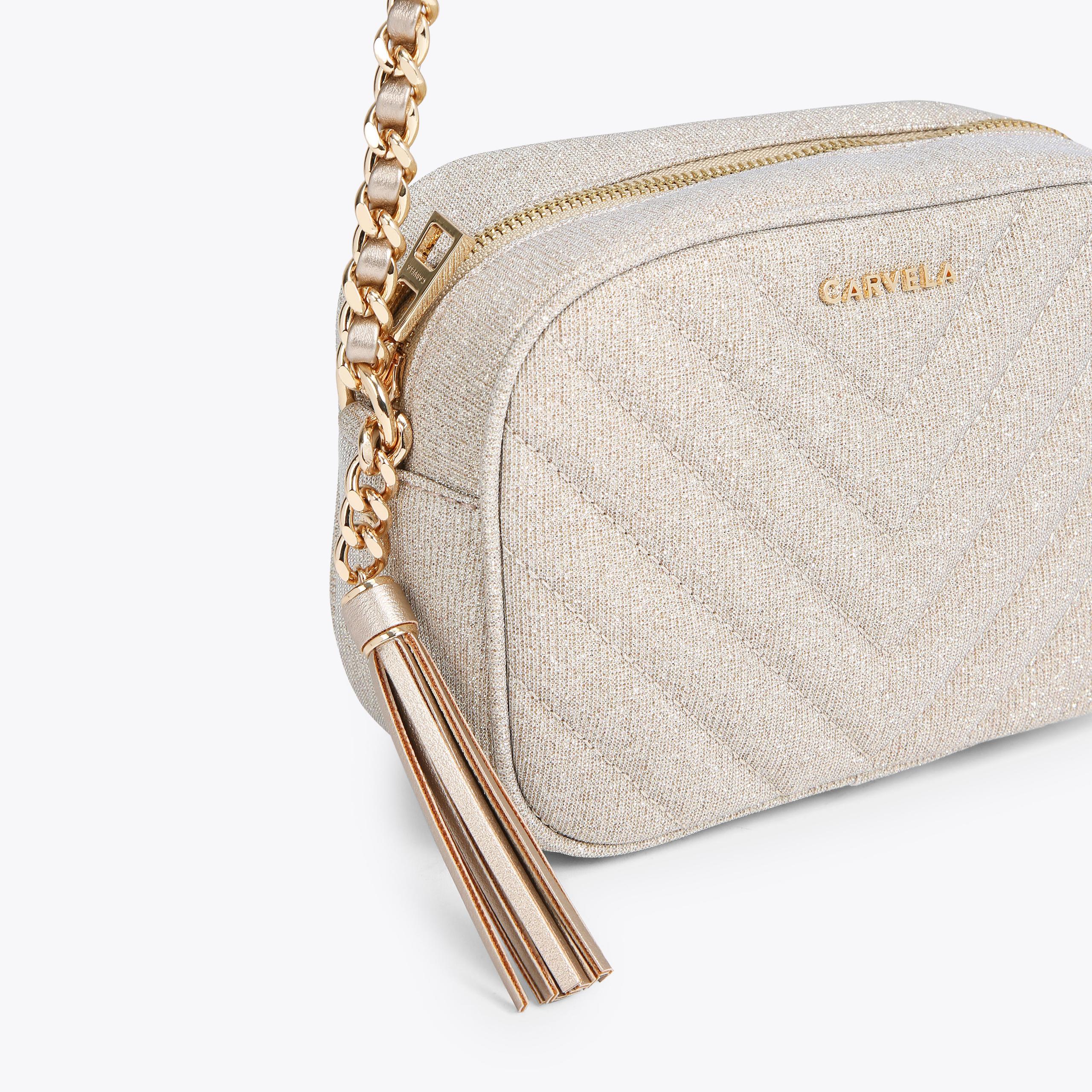 lara-tassel-x-body-gold-